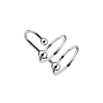 A stainless steel dual ringed sperm stopper, consisting of two cock rings connected by a penis plug.