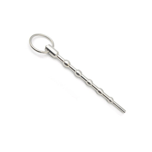 A silver-colored penis plug with a metallic finish and a small ring at the base. The plug has a series of rounded protrusions along its shaft.