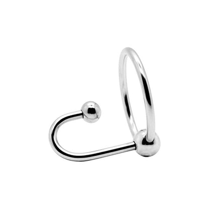 A stainless steel sperm stopper with a glans ring. The toy has a smooth, shiny finish and features a circular base with an attached ball.