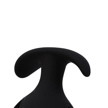 Black anal plug base close up view on a white background