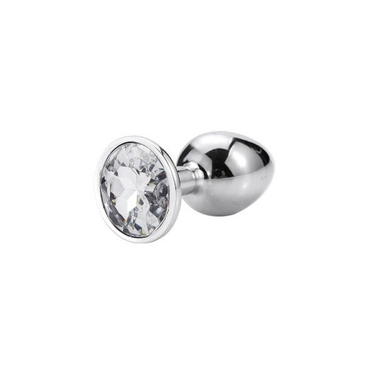 A red anal plug with a crystal-like decoration on the flared base, designed for intimate pleasure.