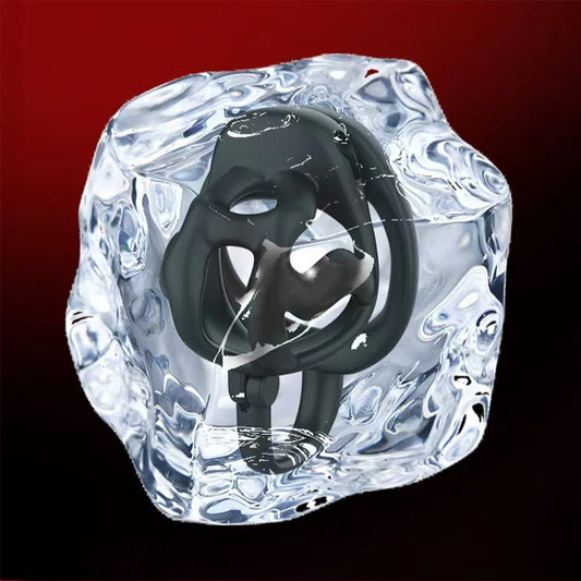 Chastity Cage D12 SoulCatch encased in clear ice cube on a dark background
