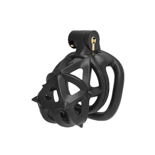 A black diamond-shaped chastity cage with removable silicone spikes designed for lockable secure play.