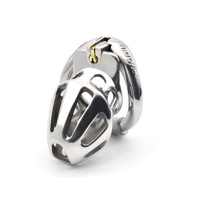 A shiny, metallic chastity cage with a complex geometric design and a small ring at the top, accompanied by a key.