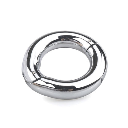 Chrome metal cock ring on a white background