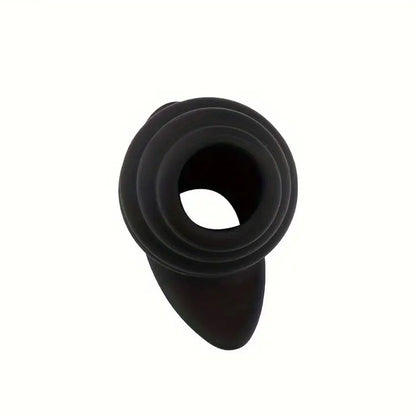 Black hallow silicone butt plug on a white background
