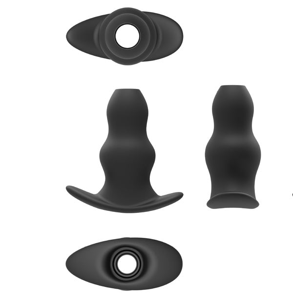 Set of black silicone butt plugs on a white background