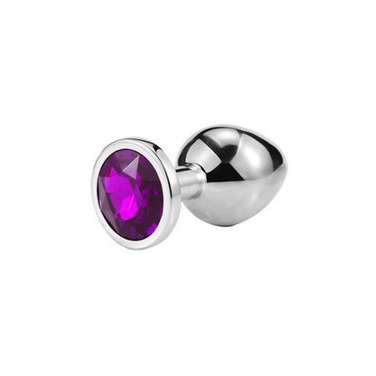 A purple anal plug with a metallic base and a round, shiny purple jewel at the top.
